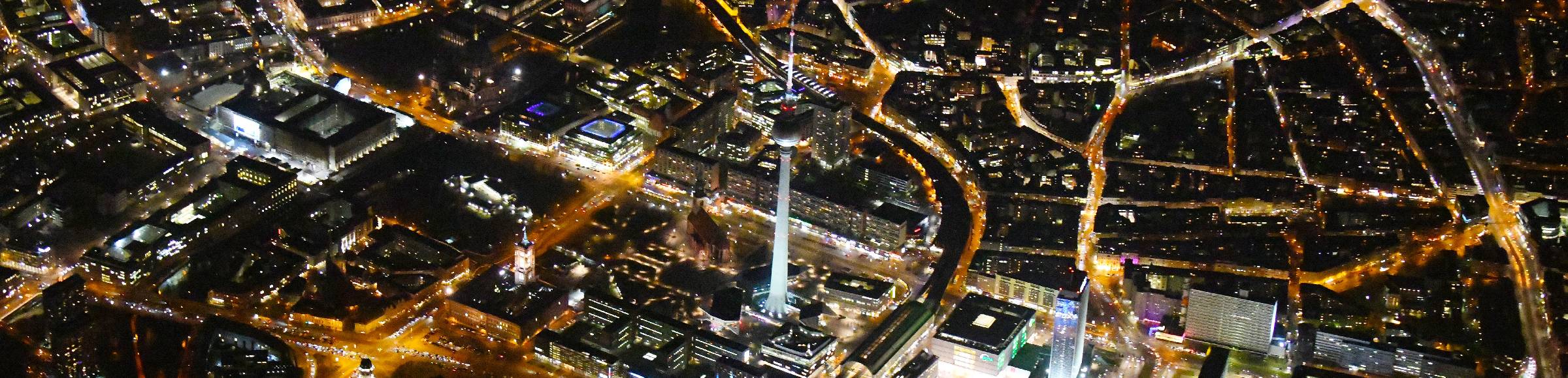 Night lighting The city center in the downtown area Ost on Berliner Fernsehturm - Alexanderstrasse - Rathausstrasse - Unter den Linden in the district Mitte in Berlin, Germany
