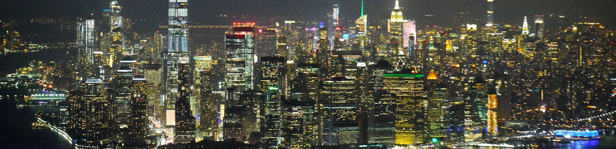 Night lighting City center with the skyline in the downtown area in the district Manhattan in New York in United States of America