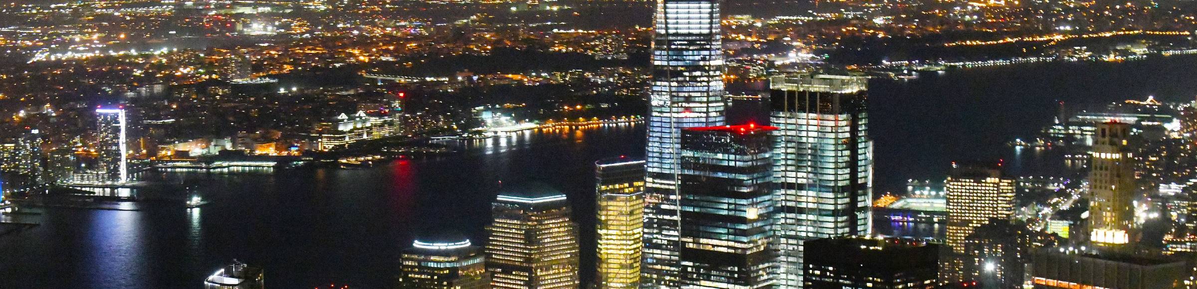 Night lighting City center with the skyline in the downtown area in the district Manhattan in New York in United States of America